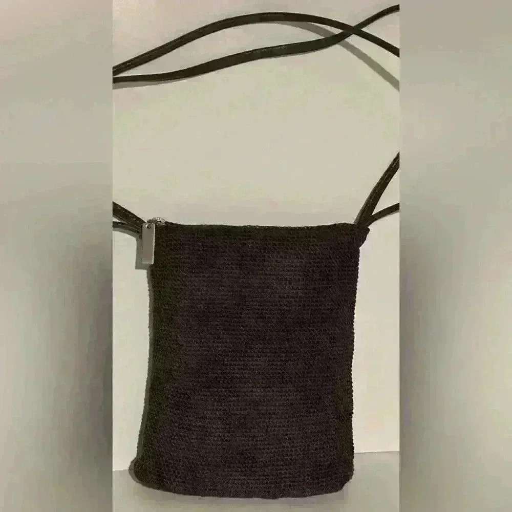 The Sak crochet brown woven shoulder bag / hobo handbag.